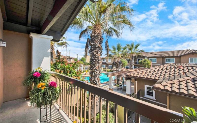 Balcony with Pool and Mature Tree view