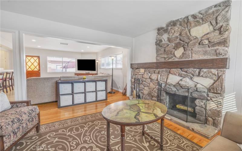 Living/entry room with rock fireplace