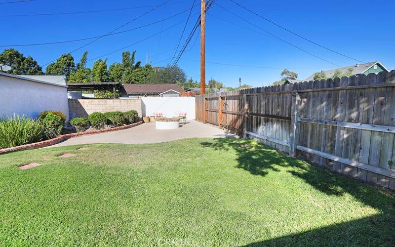 A surprise space behind the garage with a built in fire pit.