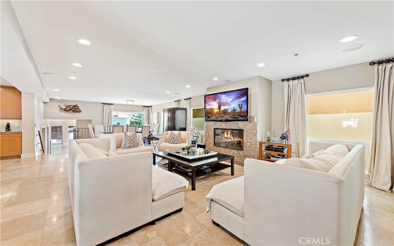 Living Room, fireplace and Dining Room