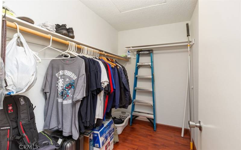 Walk-in closet in primary bedroom