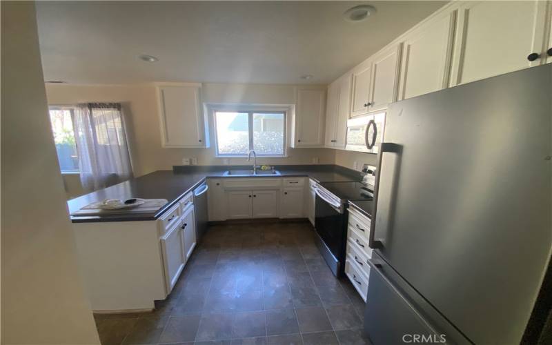 Kitchen with solid surface countertops