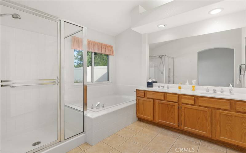 Primary bathroom with separate tub