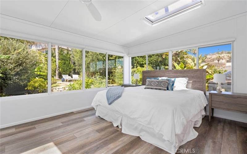 3 bedrooms upstairs each with ensuite bathrooms capture brilliant light as you enjoy views of the Pacific Ocean, Catalina Island, and rich surrounding vegetation.