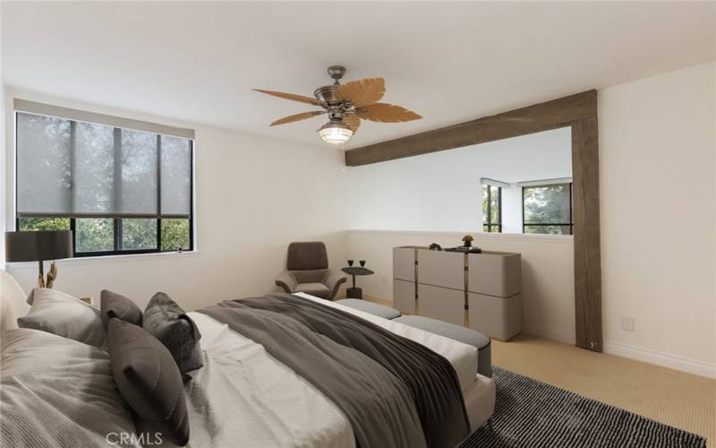 different angle of virtually staged primary bedroom upstairs