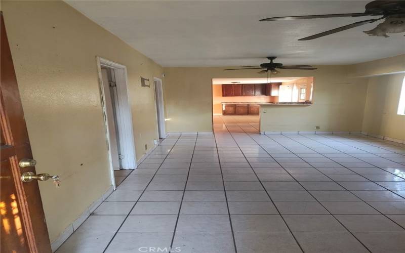 VIEW FROM LIVING ROOM TOWARDS KITCHEN AND DINING AREAS