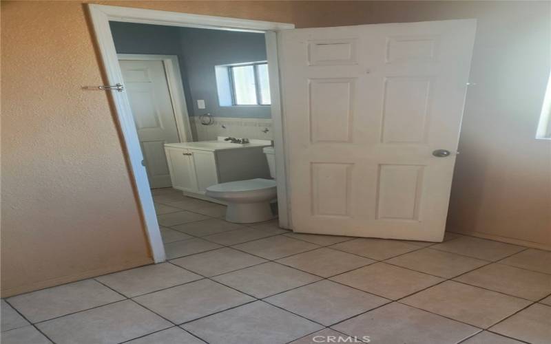 VIEW OF BEDROOM TOWARDS BATHROOM