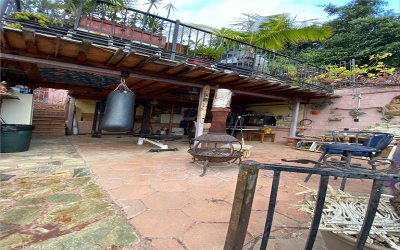 Patio cover and steps that lead to 3rd level towards converted garage/studio