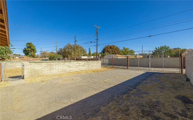 DRIVEWAY IN FRONT OF GARAGE.