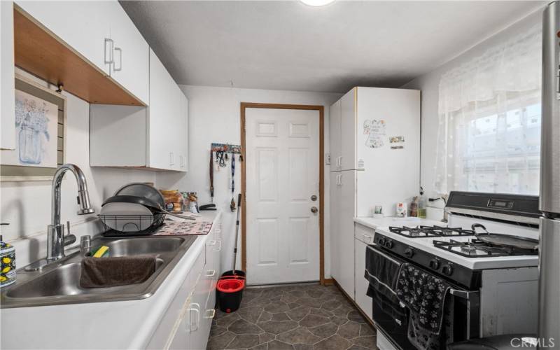 Front unit kitchen with back door entrance