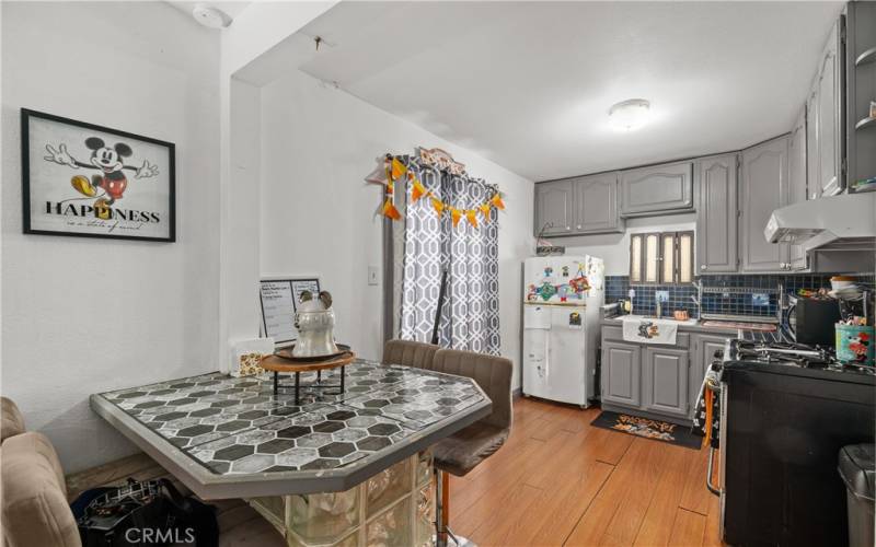 Back unit view of kitchen from living area