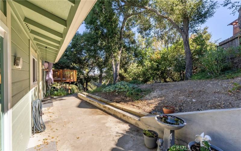 The back patio is accessed through the door in the laundry room or sliding glass door in the dining area.