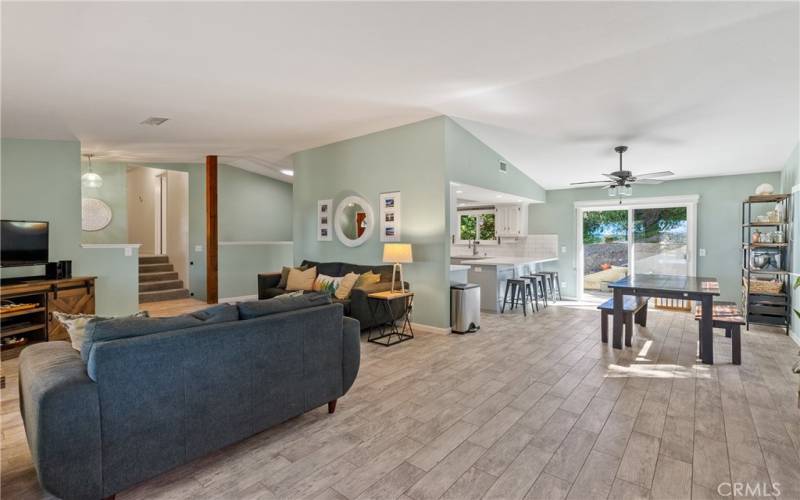 The living room flows nicely into the dining area and kitchen. Great for entertaining!