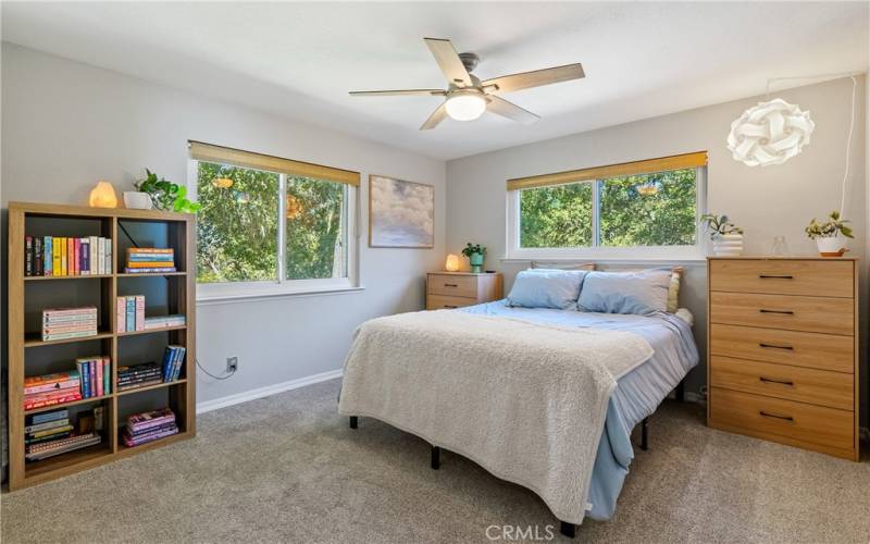 Bedroom 3 is bathed in natural light thanks to the sizeable windows.