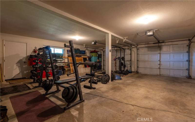 The finished 2-car garage offers room to park 2 vehicles plus plenty of room for storage.