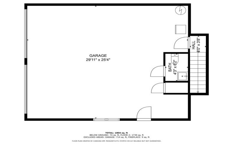 Floorplan of bottom level of the home which is the garage and half bathroom. Measurements are approximate.