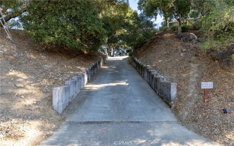 The long driveway brings you up to the home.