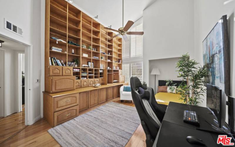 3rd bedroom with built-in bookshelf