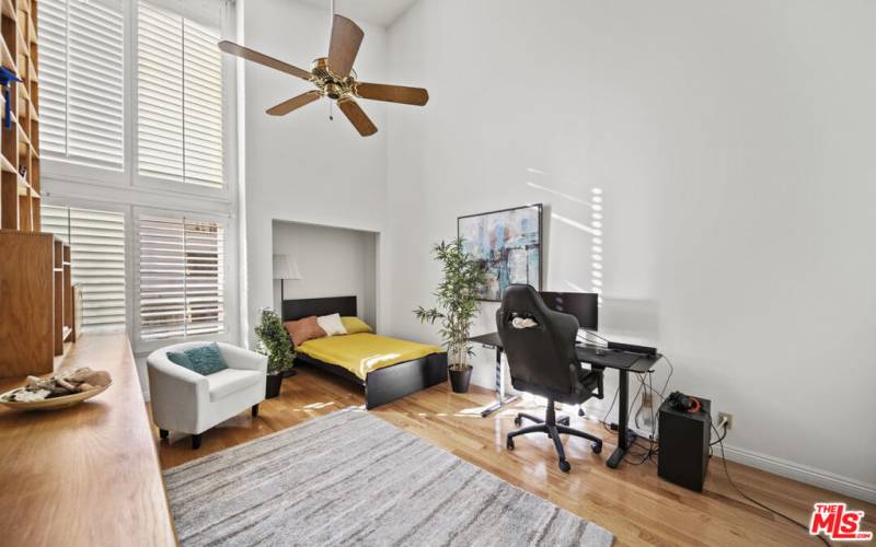 3rd bedroom with built-in bookshelf