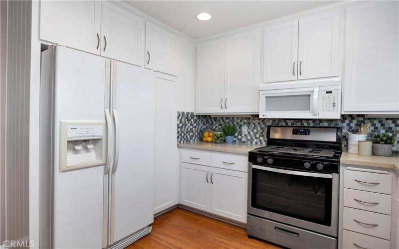 Quartz countertops, stainless range, dishwasher and sink. The refrigerator is

included.