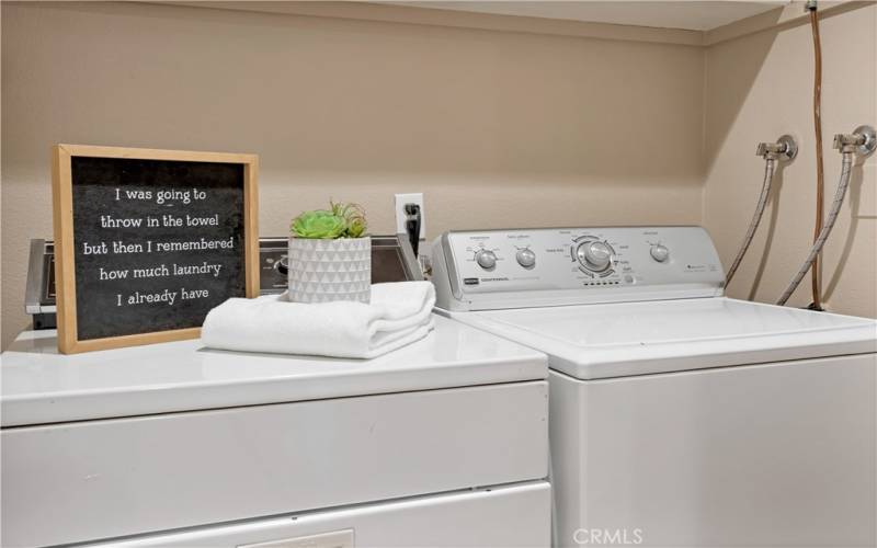 A separate laundry room and the washer and dryer are included.