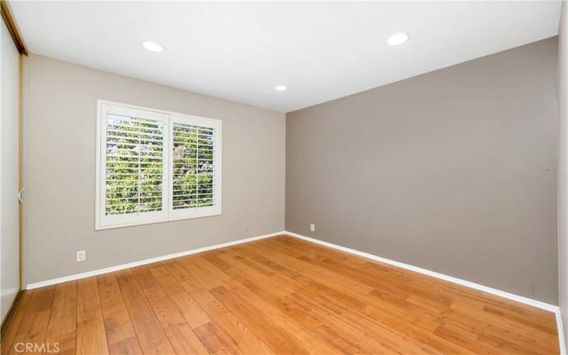 The 2nd bedroom. Love the tree view from the window.