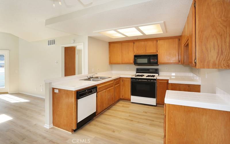 The kitchen is light and bright and open!