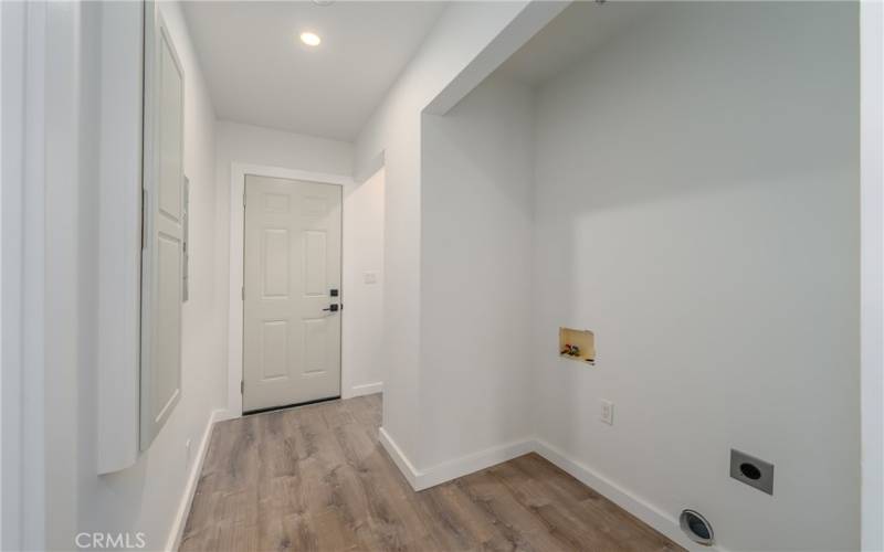 laundry closet near back door.