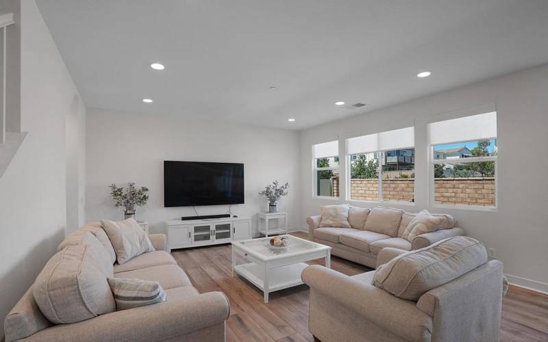 Bright and Open Living Room with CUSTOM BLINDS THROUGHOUT - Controlled by Your Phone!!!