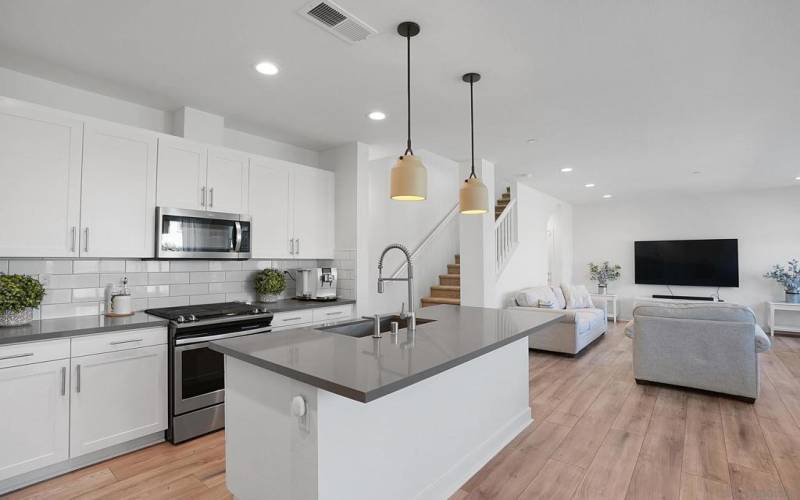 Beautiful Quartz Countertops, White Cabinets and Luxury Vinyl Flooring!