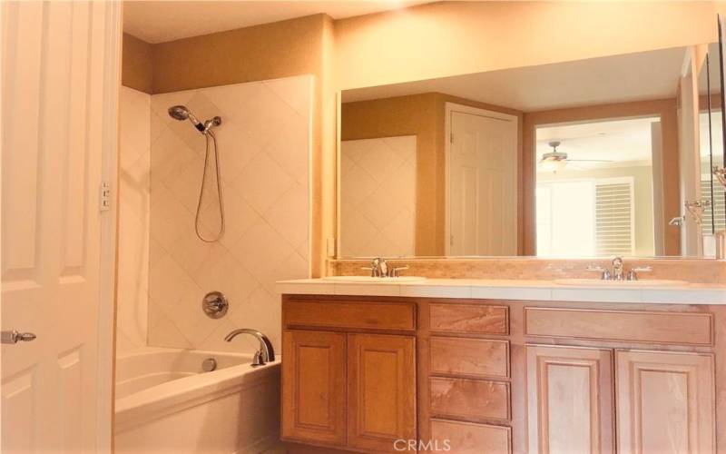 Bathroom 1 with double sinks, bath tub and shower