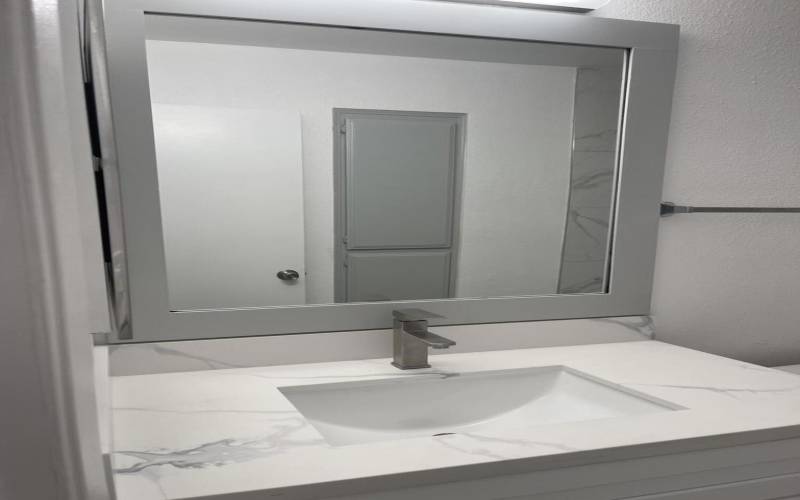 BATHROOM SINK AND MIRROR