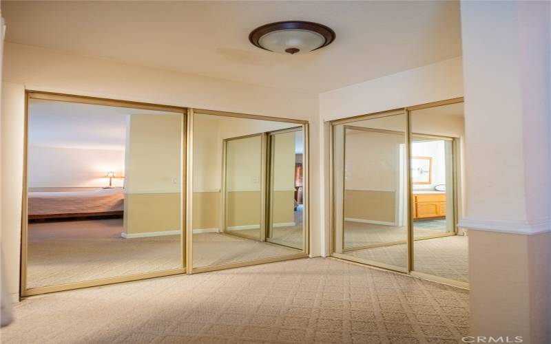 MASTER BEDROOM HAS DUAL MIRRORED CLOSETS