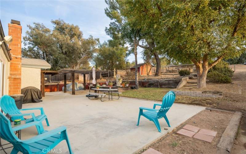 BACKYARD PATIO AREA FOR ENJOYING THE SUNSETS AND AFTERNOON BREEZE.