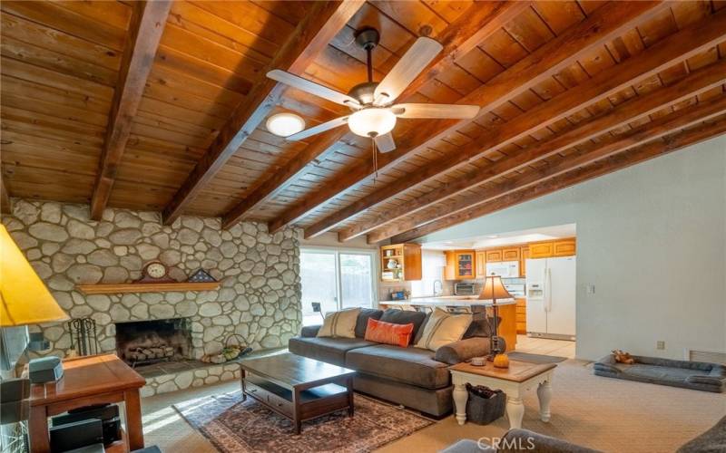 Family room open to kitchen and dining room.