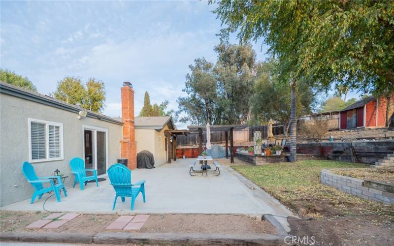  VIEW OF BACKYARD PATIO AREA FROM ROAD TO THE BACK