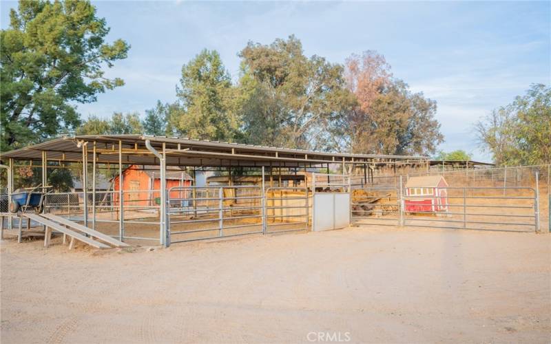 VIEW OF LIVESTOCK FULLY COVERED CORRALS AND HEN HOUSE,,,