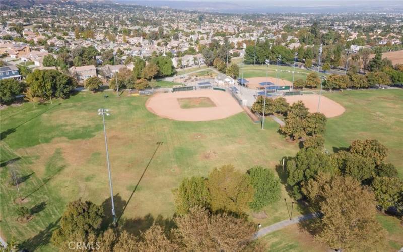 
This expansive park offers open green fields, well-maintained sports facilities, and ample space for outdoor recreation.