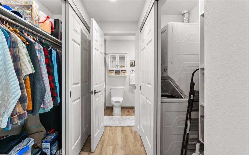 Dual closets with laundry inside