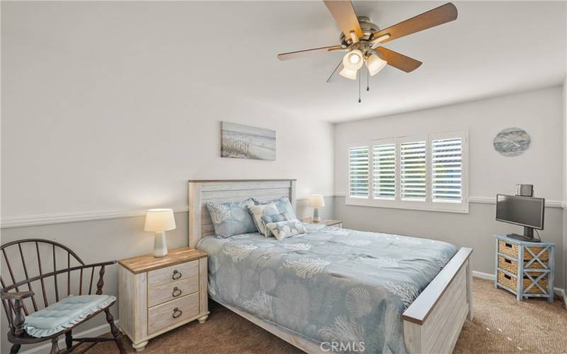 Bedroom #2 with newer carpet and plantation shutters