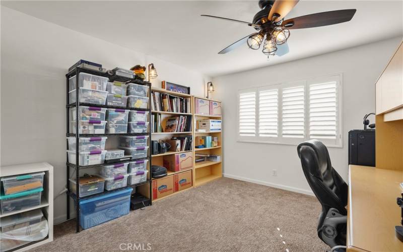 Bedroom #3 with plantation shutters and newer carpet