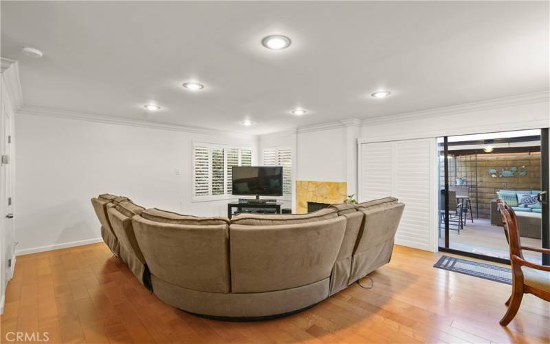 Spacious living room with sliding door to private patio