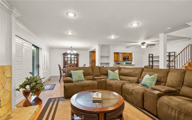 Dining room in the background with adjacent kitchen.