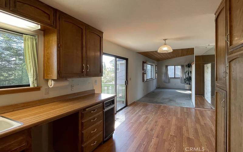 Looking back to dining area and open concept living space