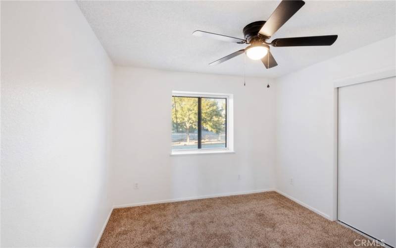 Guest bedroom 1 has fresh paint & carpet!