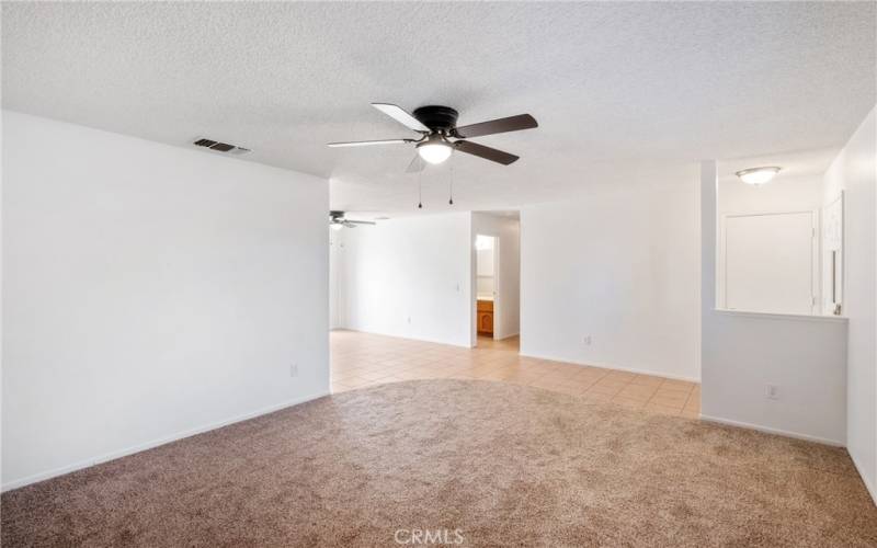 Spacious living room with new carpet!