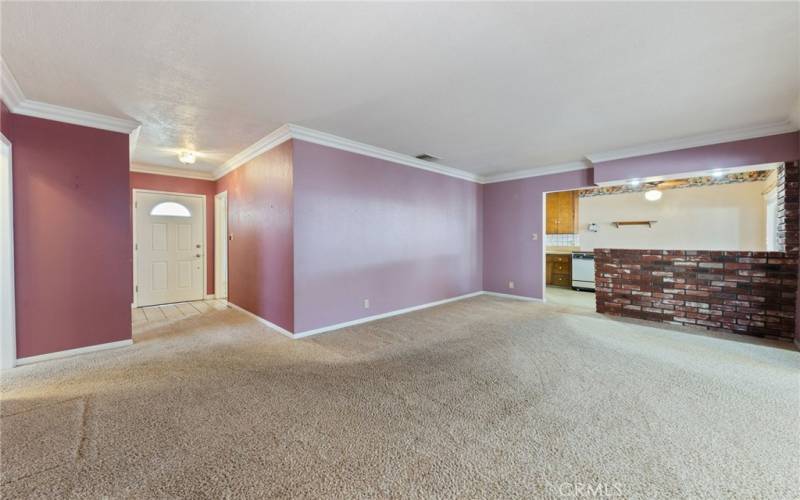 Living room towards entry / kitchen