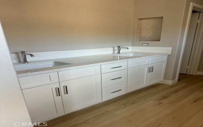 Master bath vanity with quartz countertop.