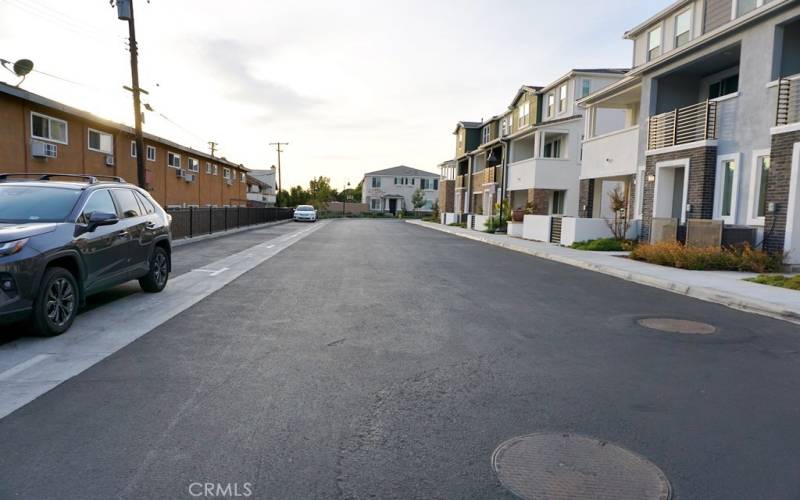 the entrace of the new community offers ample parking spots