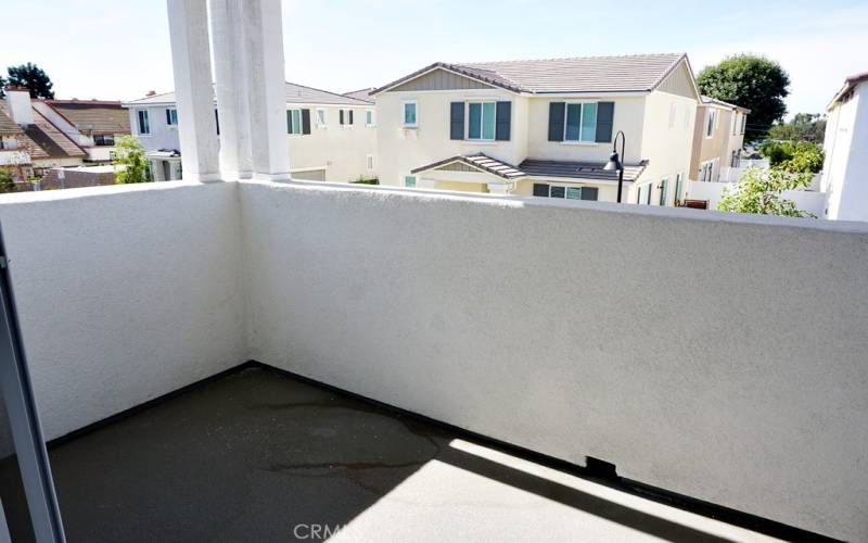 a large balcony with fresh air on the second floor through a slide door from the dining area